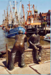 Fischerfiguren am Hafen